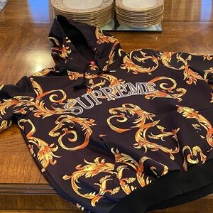 Supreme Black Hoodie with Gold Accents